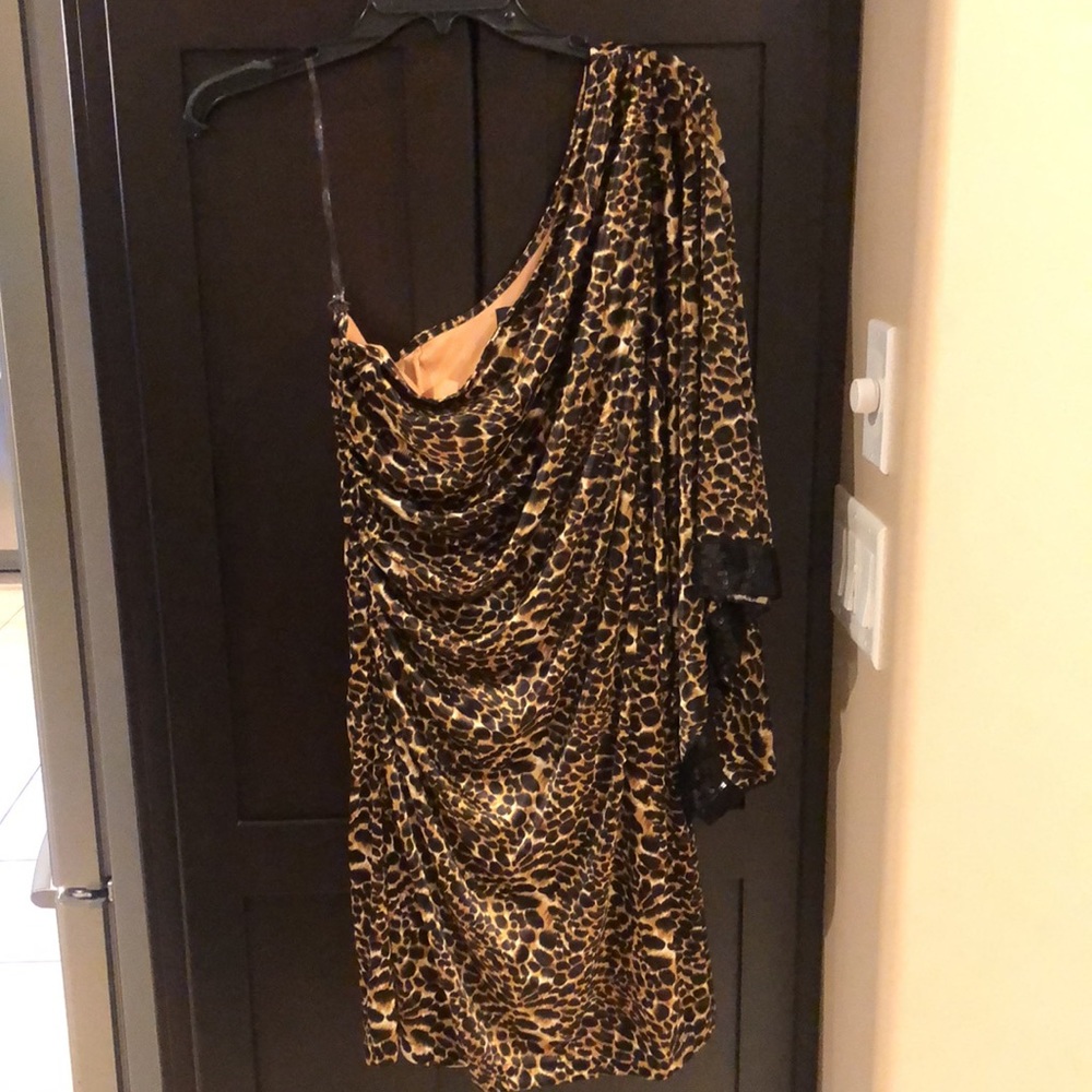 Sexy one shoulder batwing sequin trimmed sleeve dress. Satin soft material.